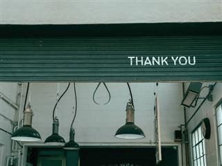 thank you written on a roll up gate