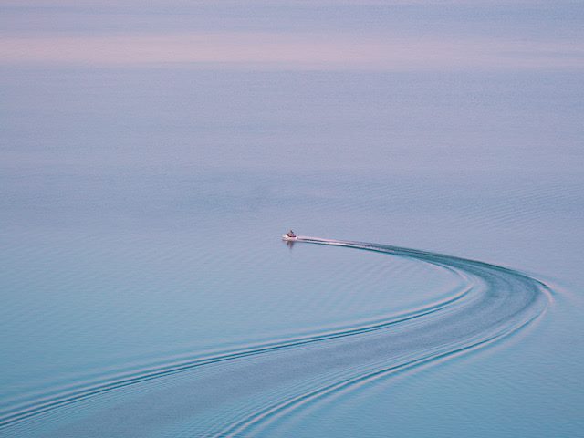 on a jet ski in very still waters