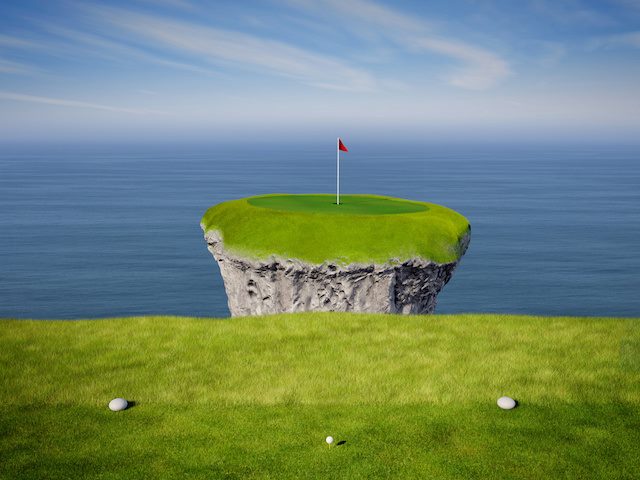 golf hole surrounded by water