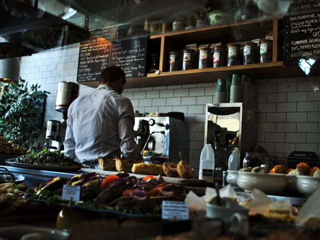 barista making coffee