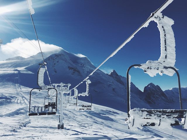 ski lift chairs covered in ice
