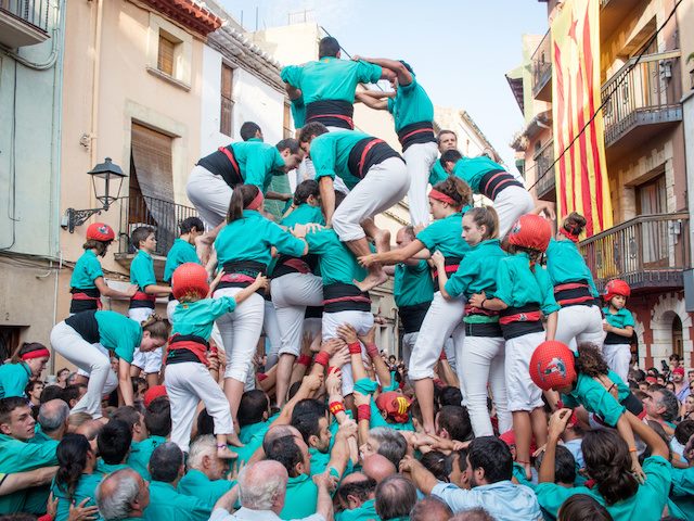 people forming a human tower