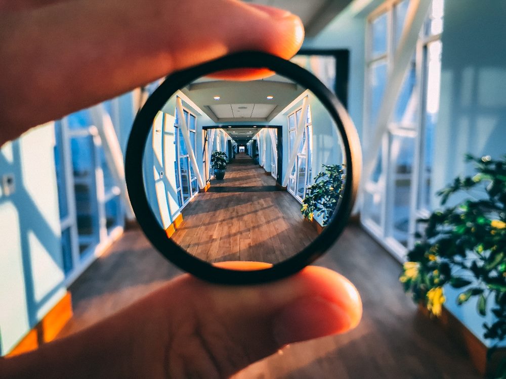 Magnification giving a long feel of depth in this large yet seemingly small sky bridge in piece about customer satisfaction strategies and focusing on priorities.