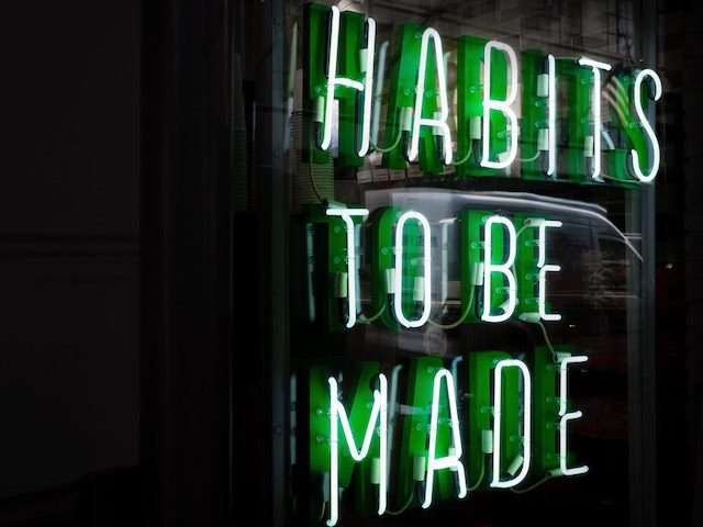 LED sign: "Habits to be made"