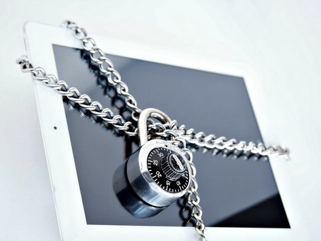 illustration of a lock and chain around a computer monitor