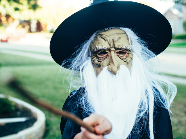 kid in wizard costume