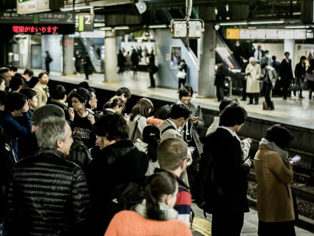 standing on a subway platform
