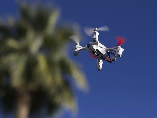 A drone flying in the sky.