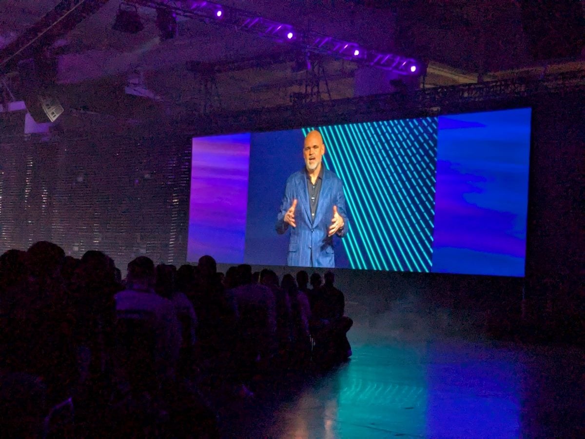 Qualtrics CEO Jason Maynard on a large projector screen during his keynote at Qualtrics X4 Experience Management Summit Wednesday, March 18, 2026 at the Seattle Convention Center.