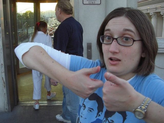 half-hearted thumbs up