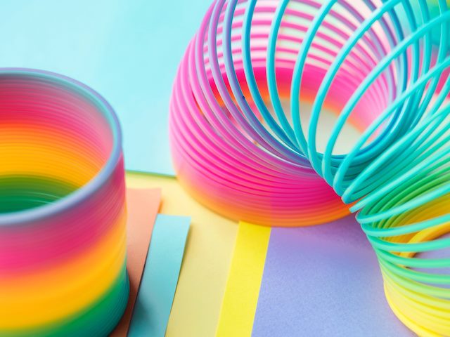 two rainbow colored slinkies