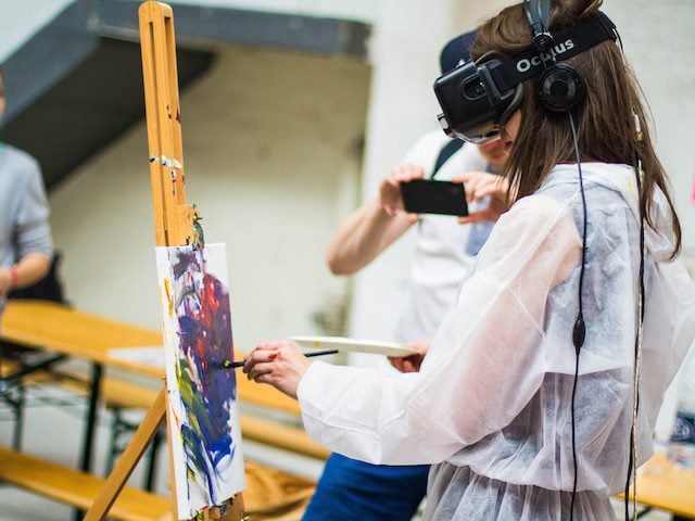 painting with virtual reality headset on