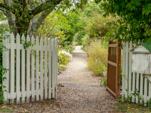 A gate open to a walkway 