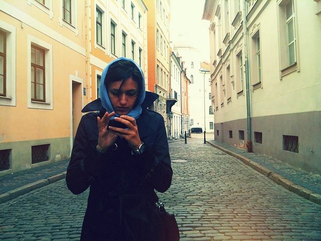 texting on a cold sunny day