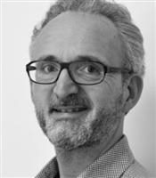 Headshot of Arjen van den Akker, SDL's product director of marketing.