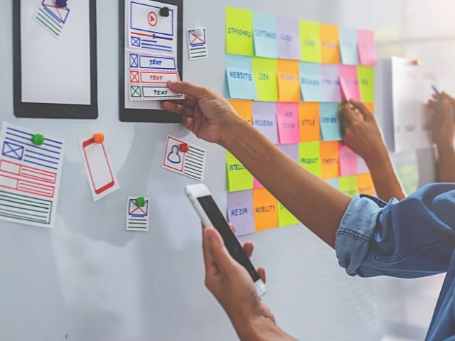 A user experience (UX) designer prototyping a web application. 
