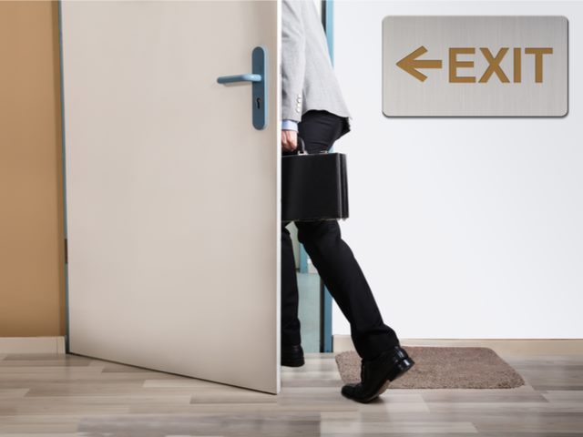 Businessman heading for the exit door