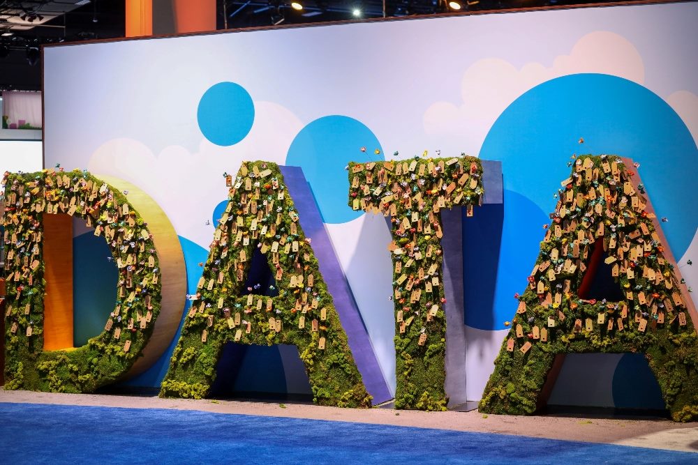 Sign made out of fake grass that says, "Data" at the Tableau conference.