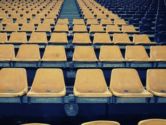 a lot of empty seats in a stadium