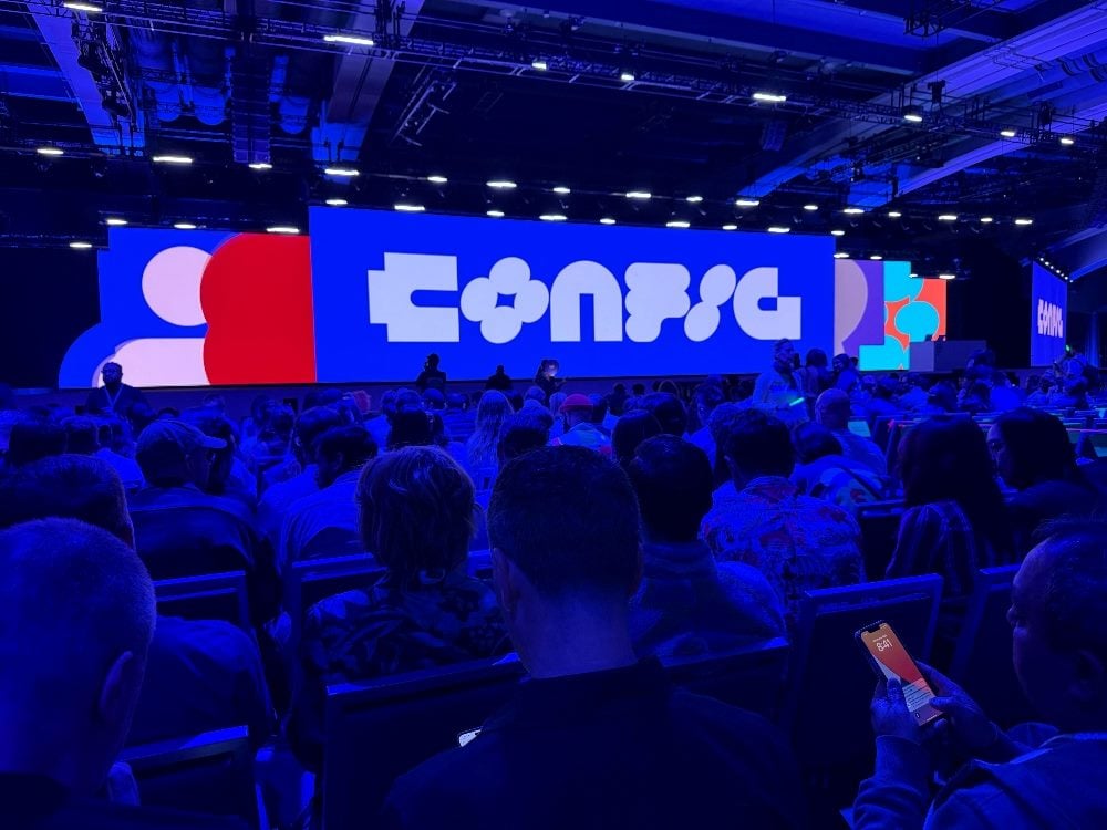 Inside the Figma Config 2025 keynote in San Francisco, showing attendees and the keynote stage.