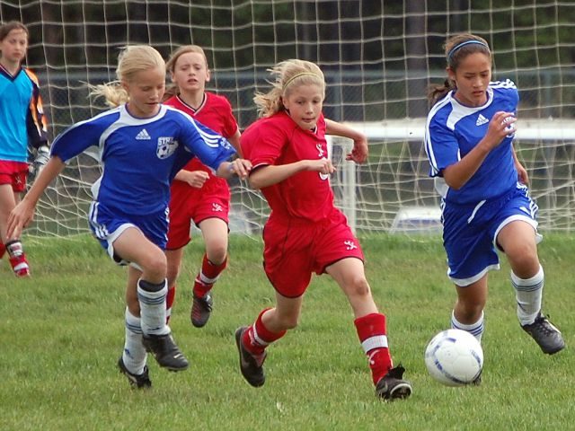 Determined girl soccer players
