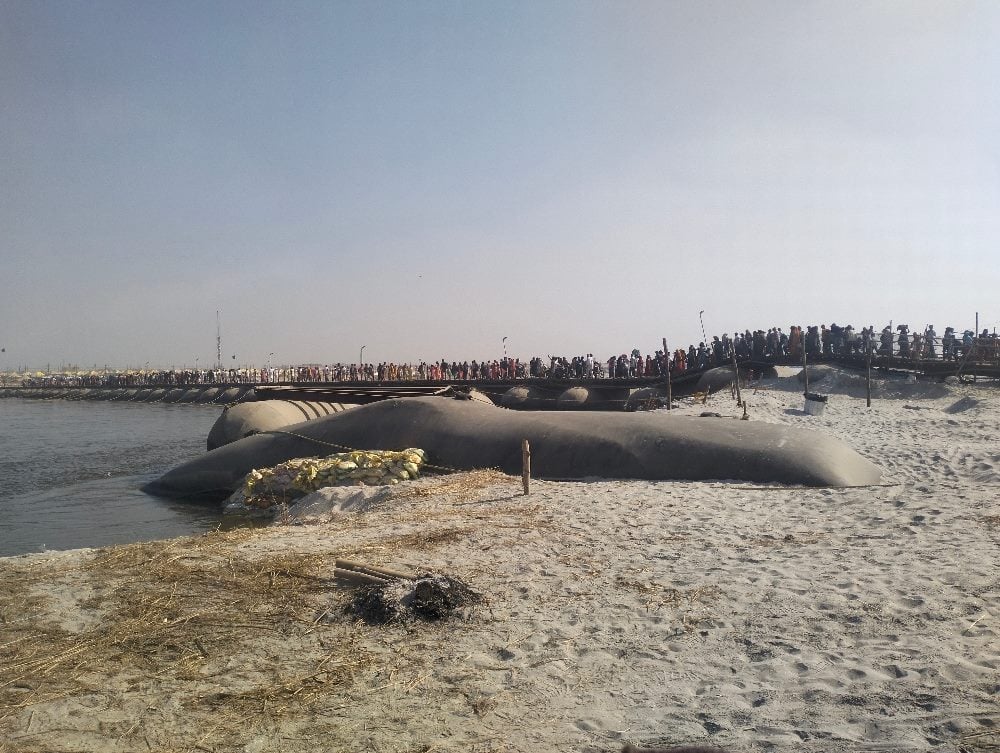 Temporary pontoon bridges as devotees cross the Ganges river at Maha Kumbh 2025.