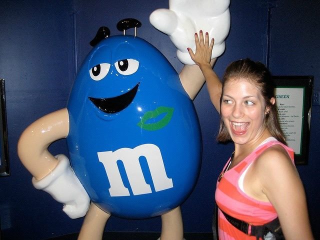 high fiving an m'n'm