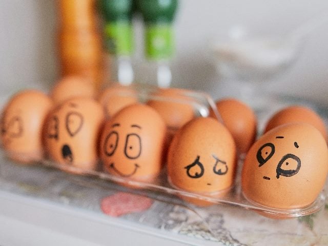 Eggs painted to represent different human emotions.
