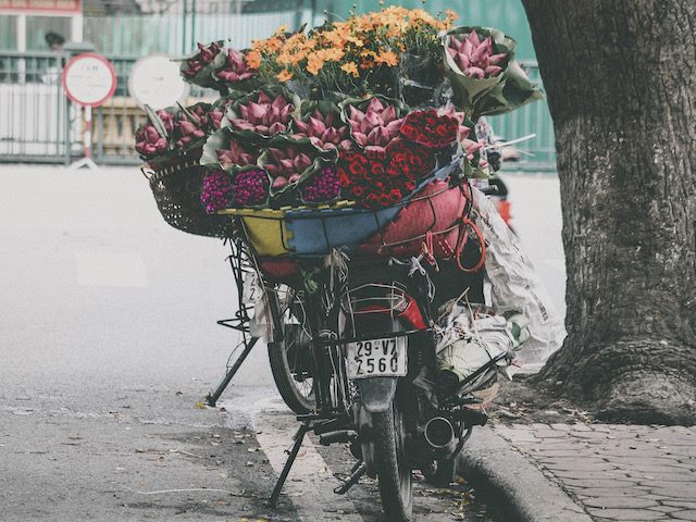 motorcycle laden with a flower delivery