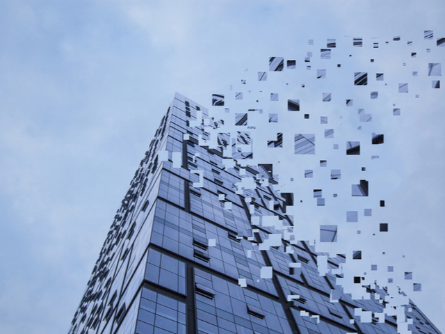 A building being built taller with smaller pixelated pieces - Building a business with cognitive search concept