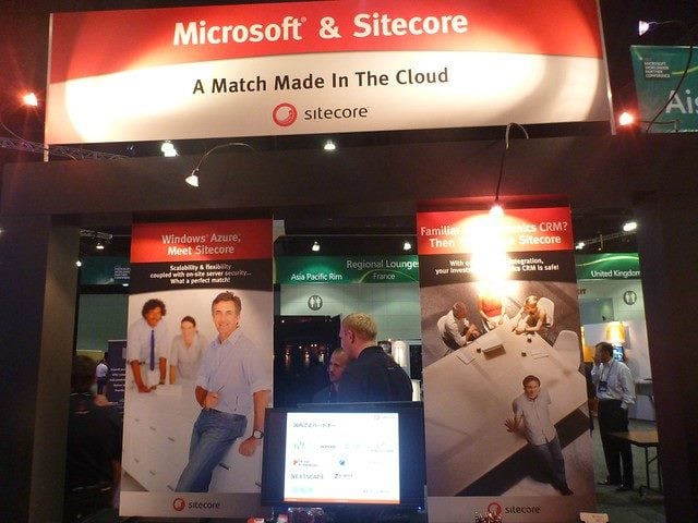 Sitecore and Microsoft partnership booth at tech show. 