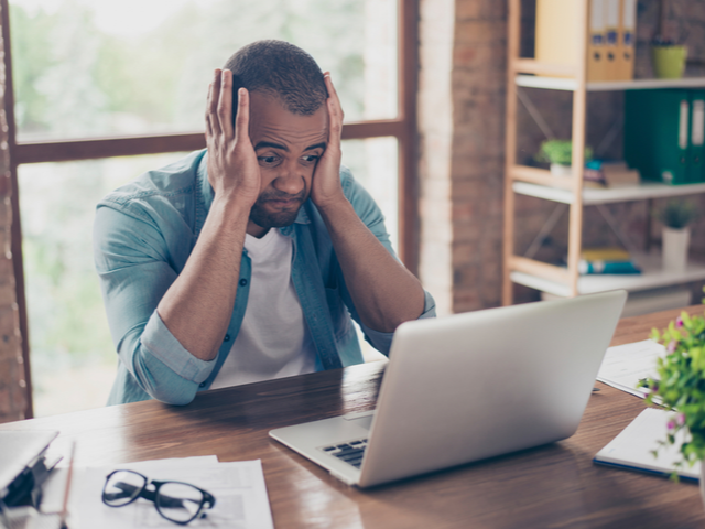 A frustrated marketer trying to understand the KPIs that matter for his podcast - audio marketing challenges concept