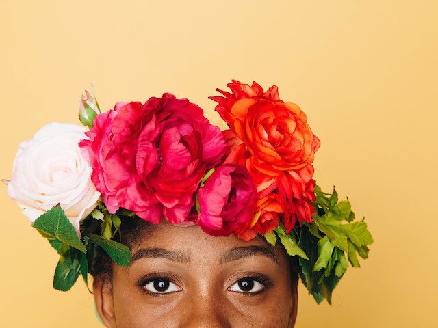 woman with floral crown on