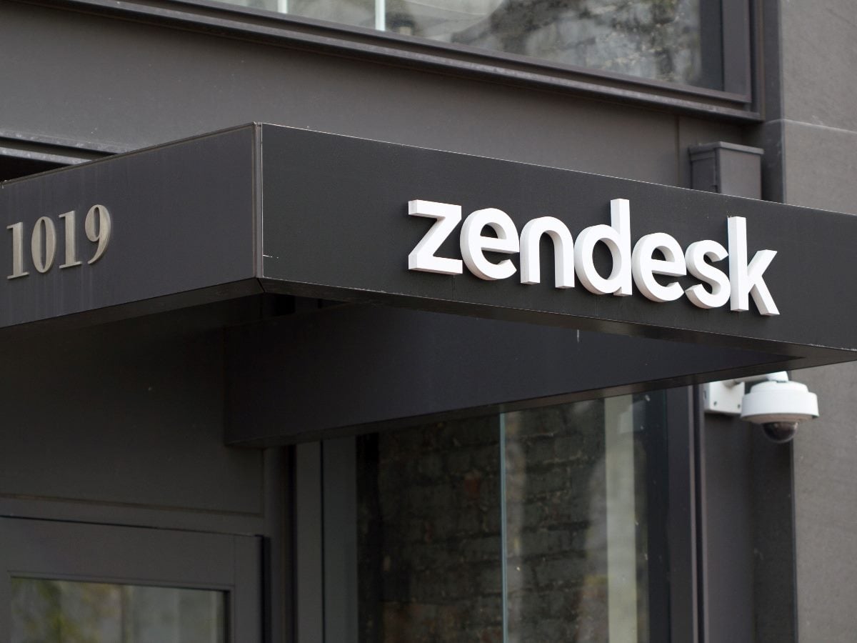 Zendesk logo displayed on the exterior sign above the entrance of a company office building.