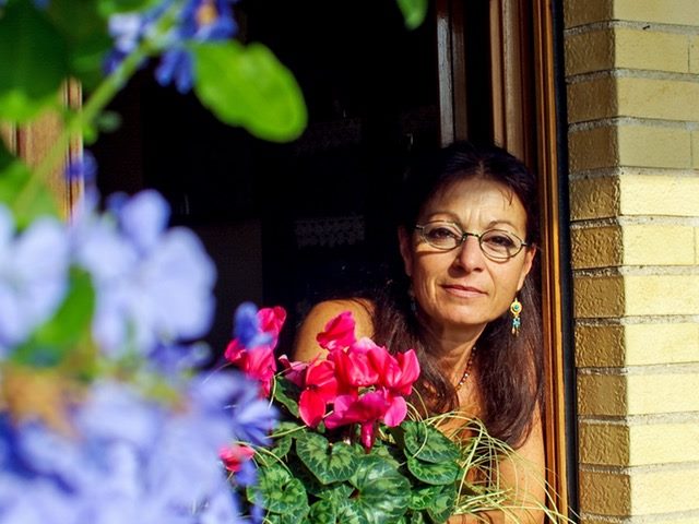 woman looking out of a window