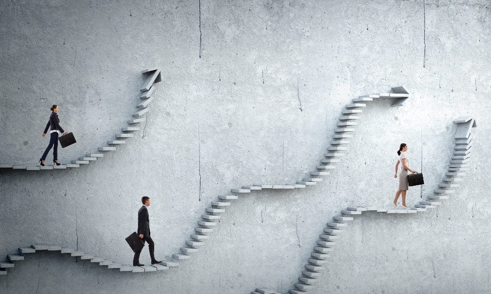 Men and women in business attire go up sloping and winding career ladders in story about how customer engagement activities can boost careers.