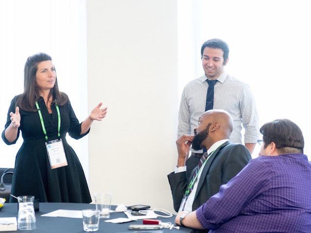 DWX attendees in conversation