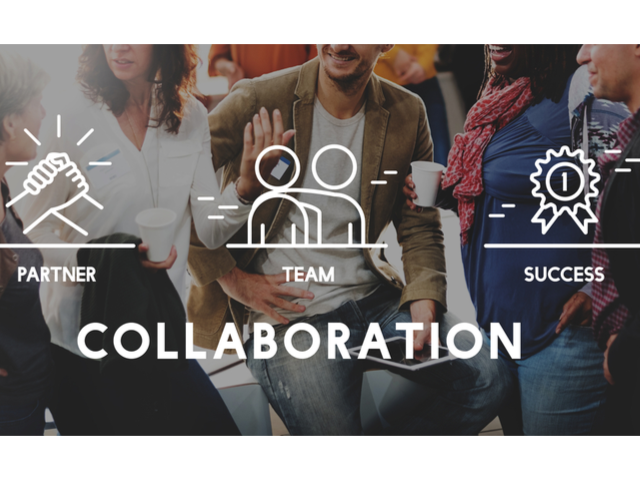 Workplace collaboration concept with marketers sitting together discussing which collaboration tool to invest in