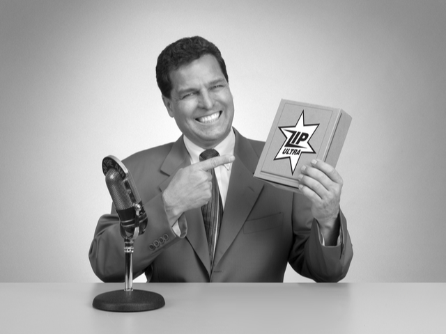 Retro pitch man in black and white from a 1950's era TV commercial