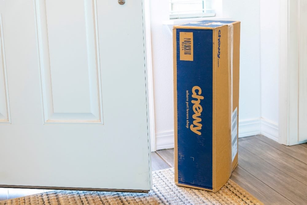 A delivered package from Chewy, the company that specializes in pet food and supplies, inside the doorway of a home in Spokane, Washington, on February 2 2023.