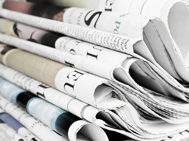 Stack of newspapers.