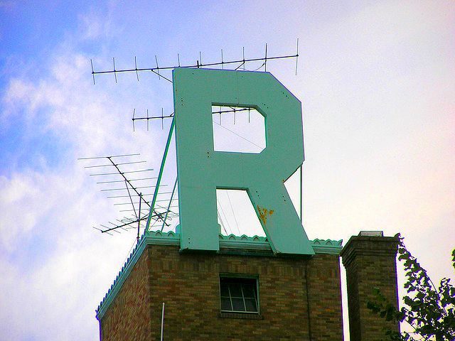 the letter R on a roof