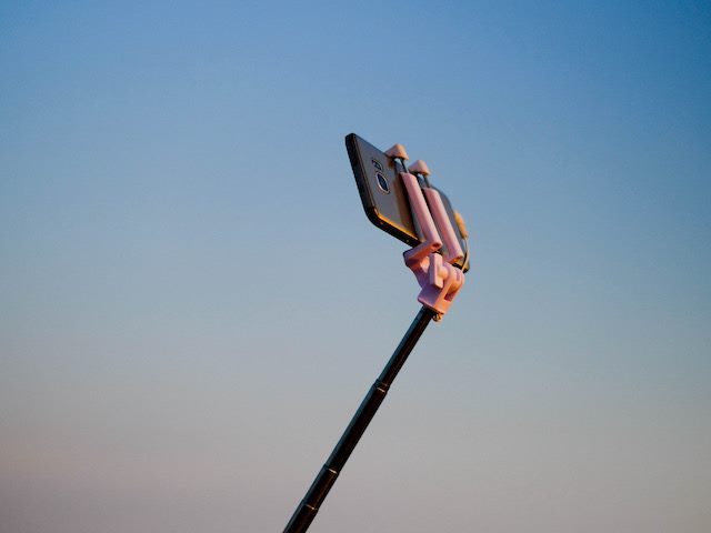 selfie stick isolated in the air