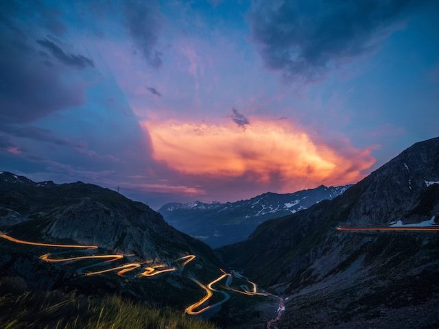 zig zagging road through the countryside at dusk