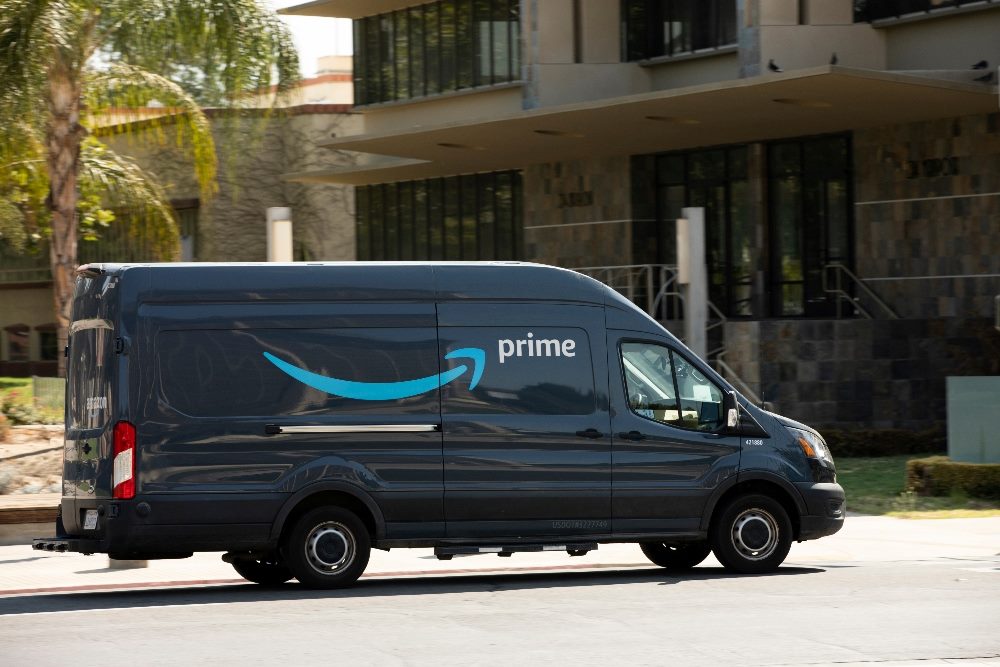 An Amazon Prime truck makes a delivery in downtown Fresno, California, in piece about customer obsession.