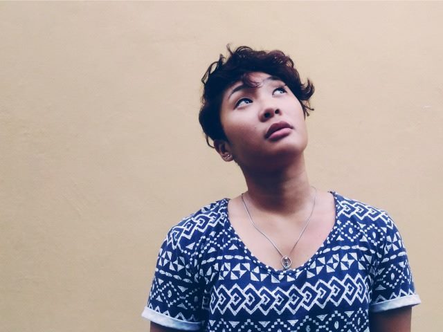 a woman looking up to the sky