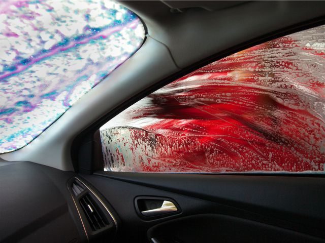inside the car at the car wash