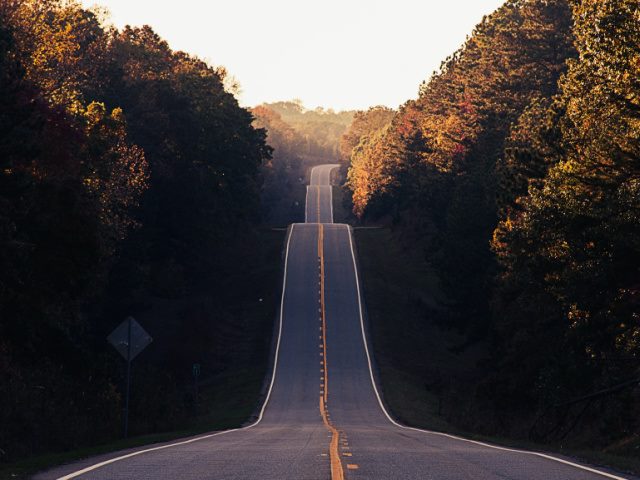 photo of a hilly road reaching into the distance