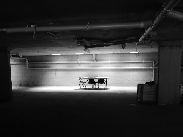 abandoned room with overhead lighting