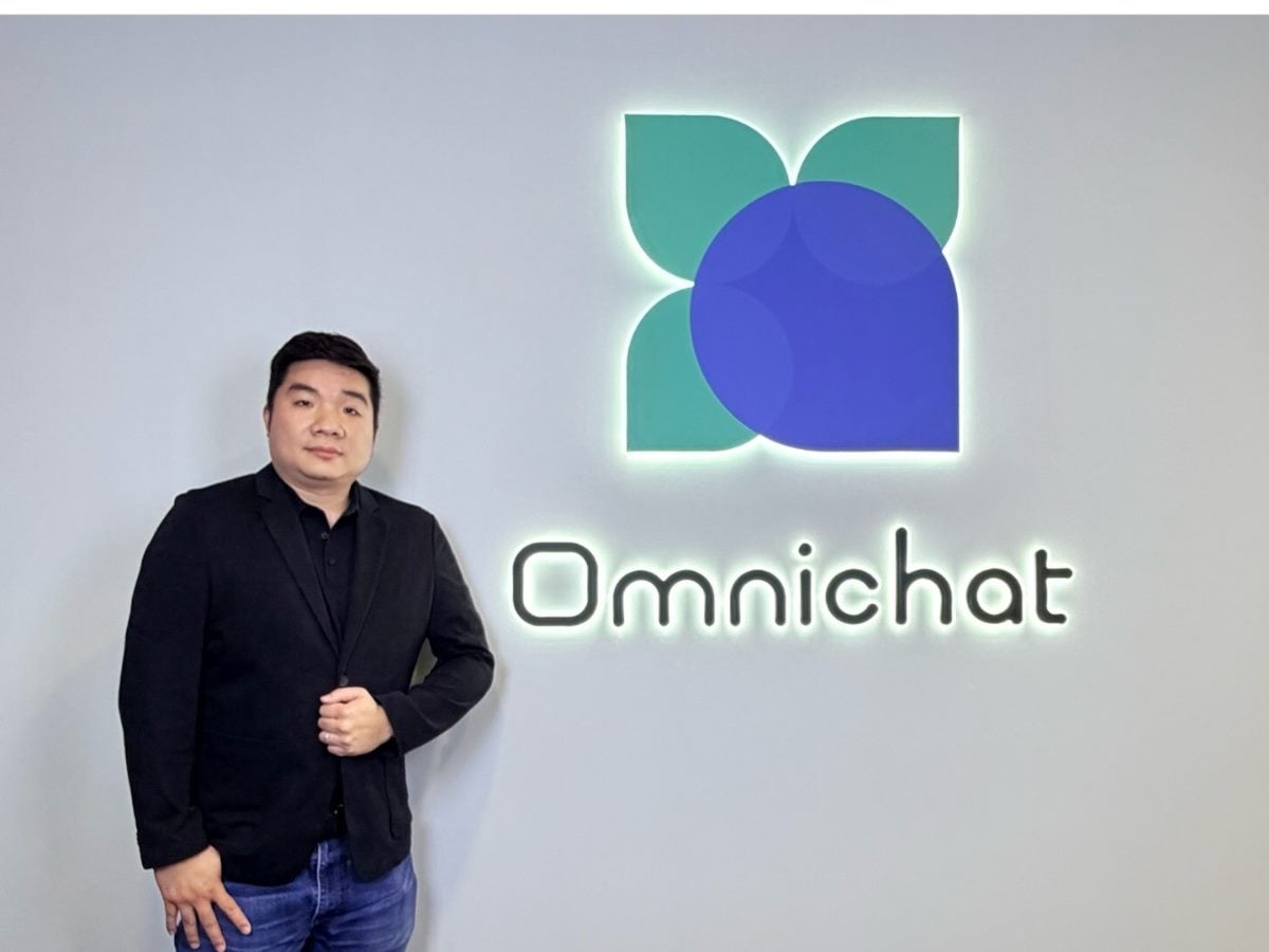 Alan Chan, founder and CEO of Omnichat, pictured in front of his company's logo on a wall. He leads the company’s strategic evolution into an AI-native agentic platform.